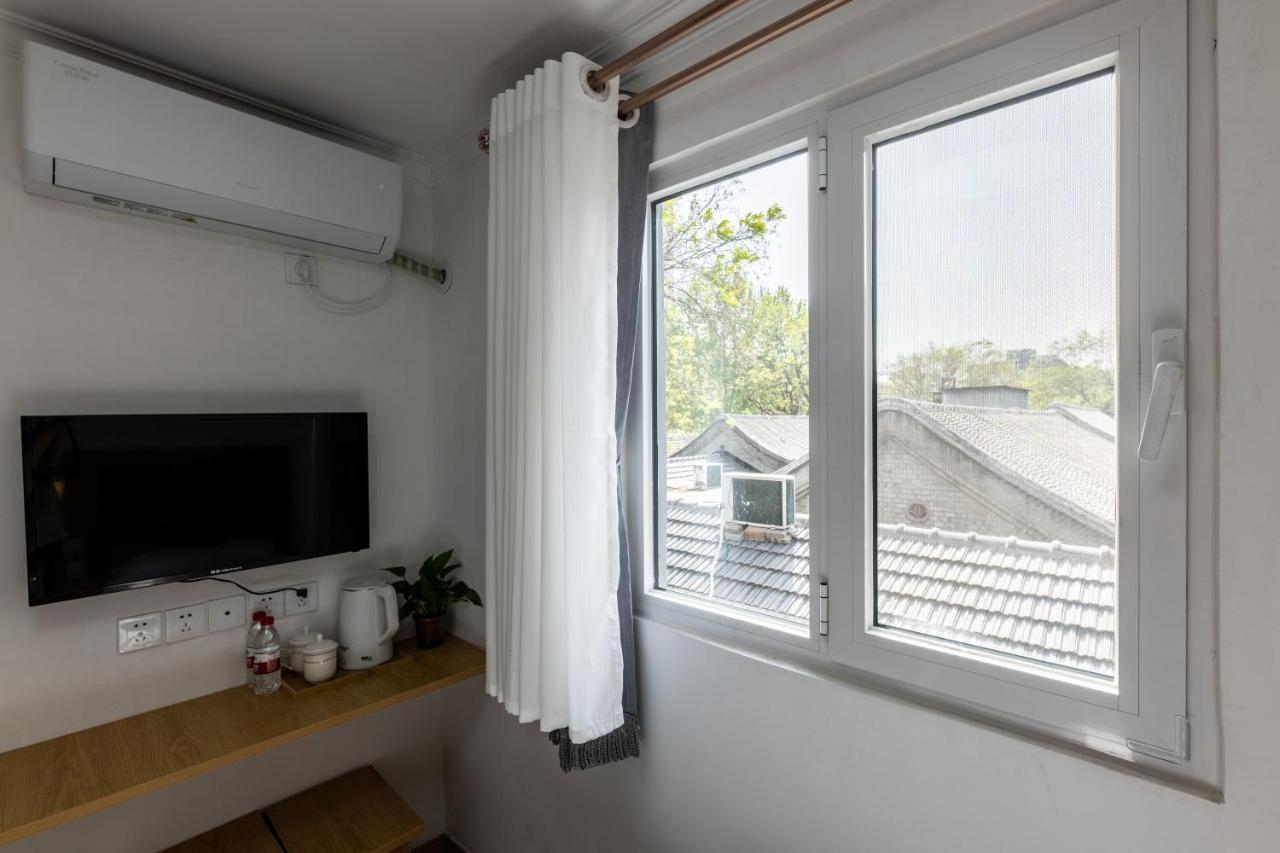 Happy Dragon Hotel -- Nearby Tiananmen Square & Forbidden City & Wangfujing Street & Line 5,6,8 Subway Nearby & Free Coffee & Free Laundry & Fluent English Speaking & Tourist Attractions Ticket Service & Free Wifi Unlimited For Western Software Beijing Bagian luar foto